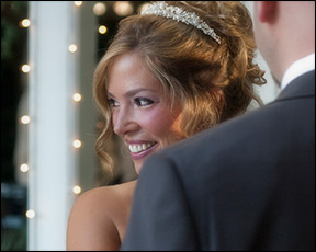 candid photojournalism of a bride glowing during their wedding ceremony