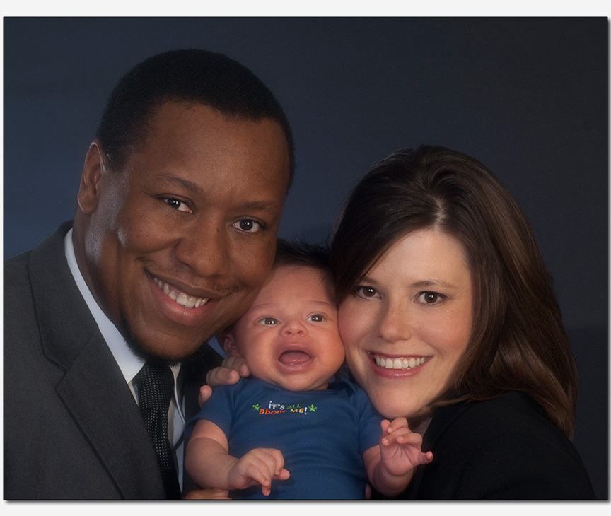 biracial couple and their weeks old baby boy