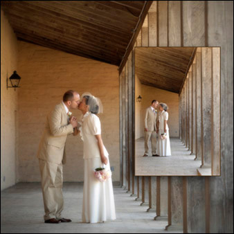 black and white image of bride and groom covered with bride's veil - testimonials photo